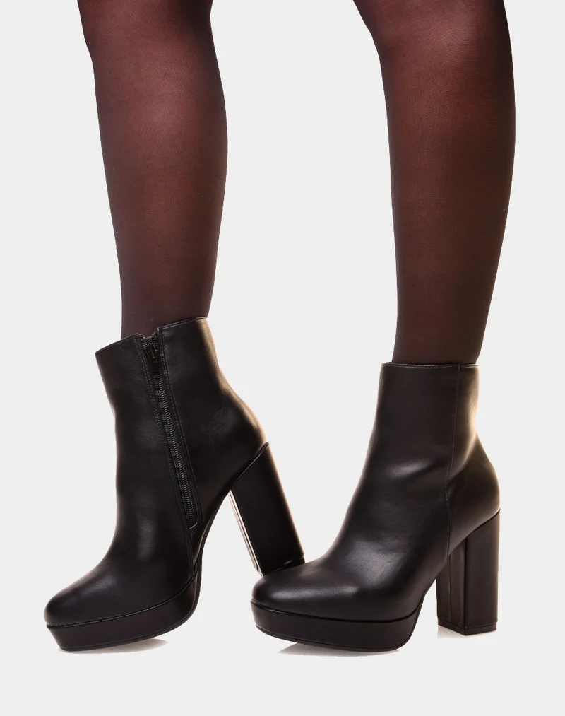 Bottines noires à talon et à grosse plateforme