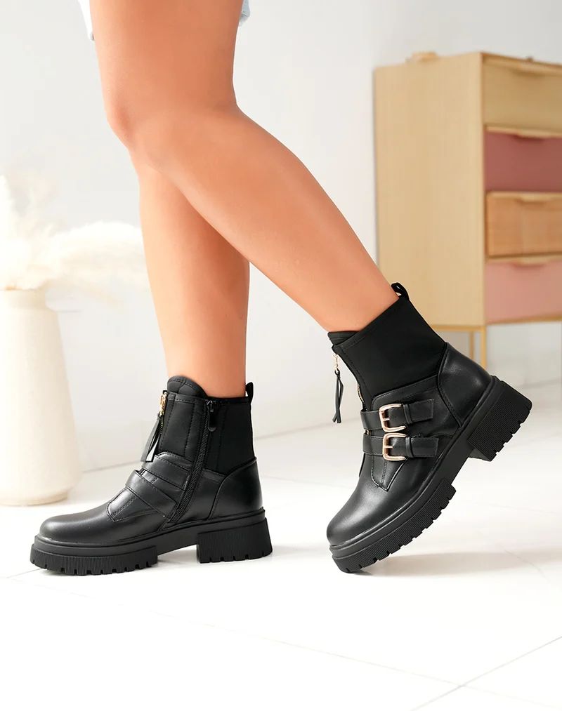 Bottines noires: Zippé et détails dorés