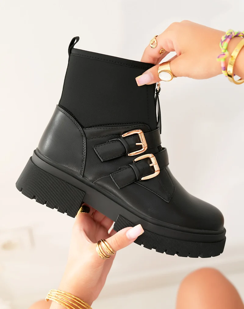 Bottines noires: Zippé et détails dorés