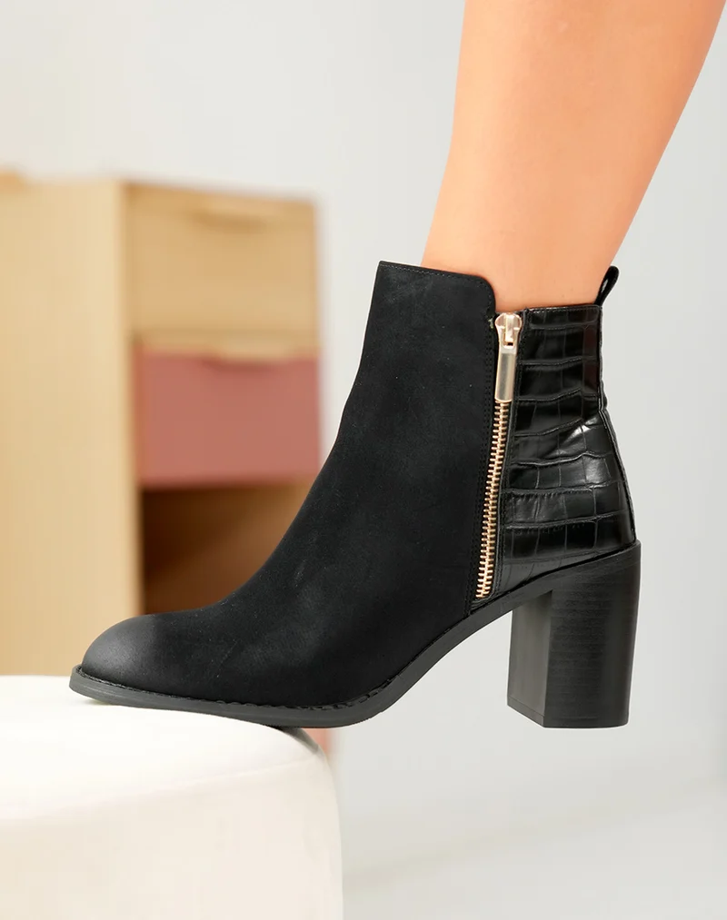 Bottines Noires Bi-Matière : Un Classique Réinventé avec Élégance