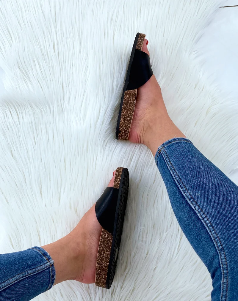 Mules noires à boucles et à semelles anatomiques