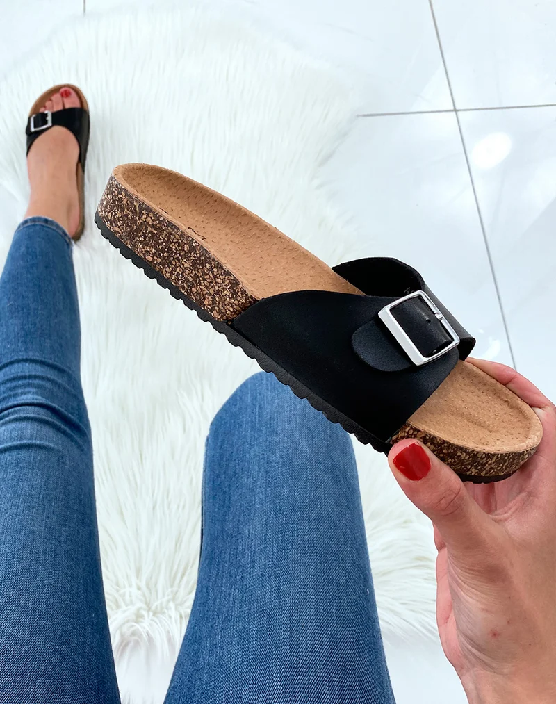 Mules noires à boucles et à semelles anatomiques