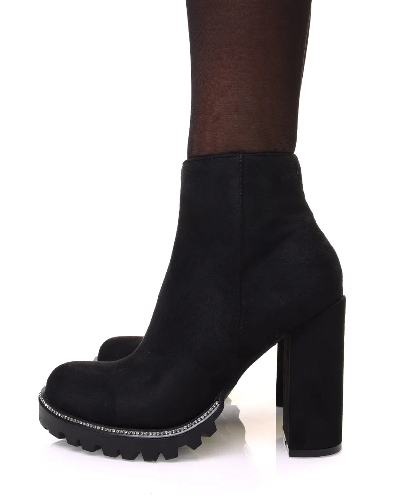 Bottines noires en suédine à talon et semelle crantée