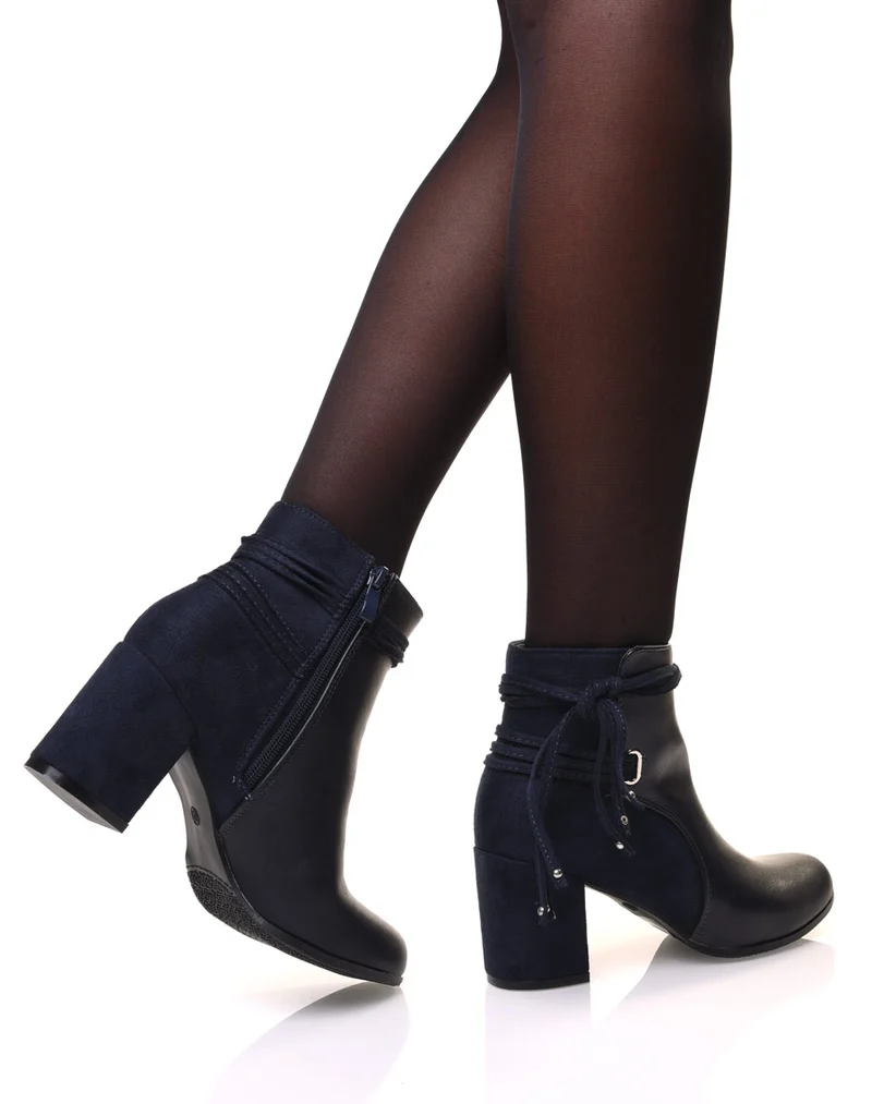 Bottines bleu bi-matière à talons et détails liens