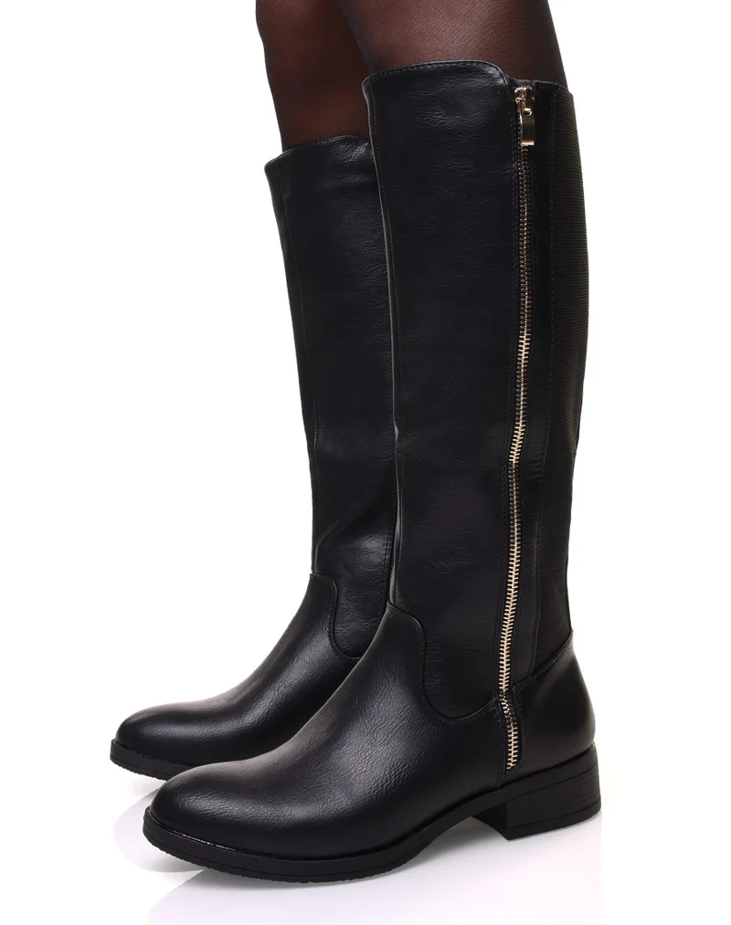 Bottes noires avec fermeture éclair dorée