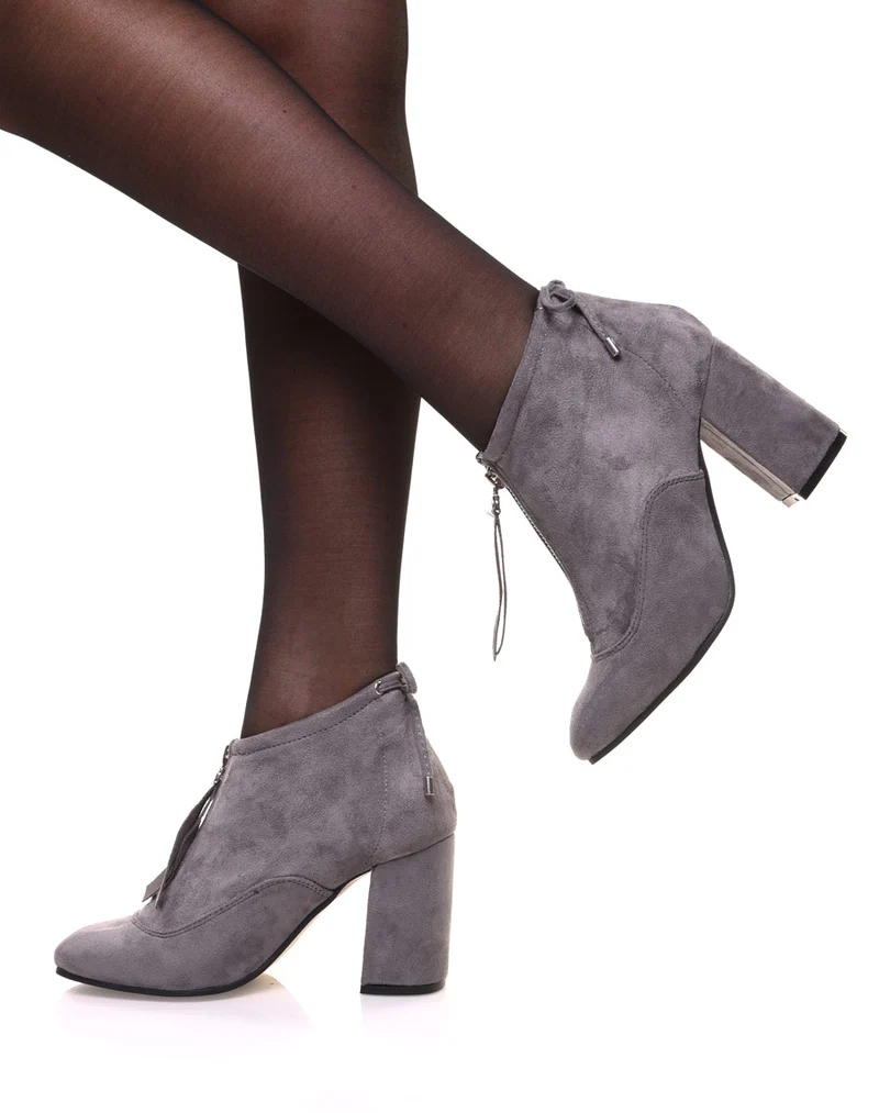 Bottines souples en suédine grises à talons hauts