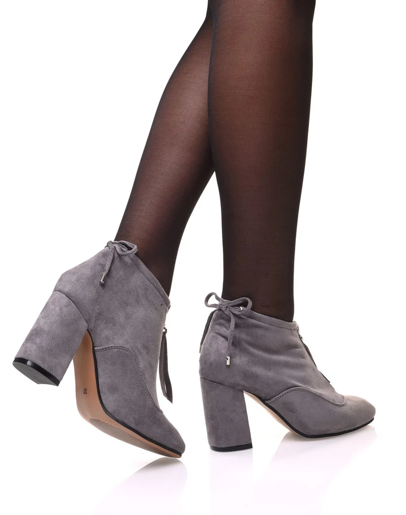 Bottines souples en suédine grises à talons hauts