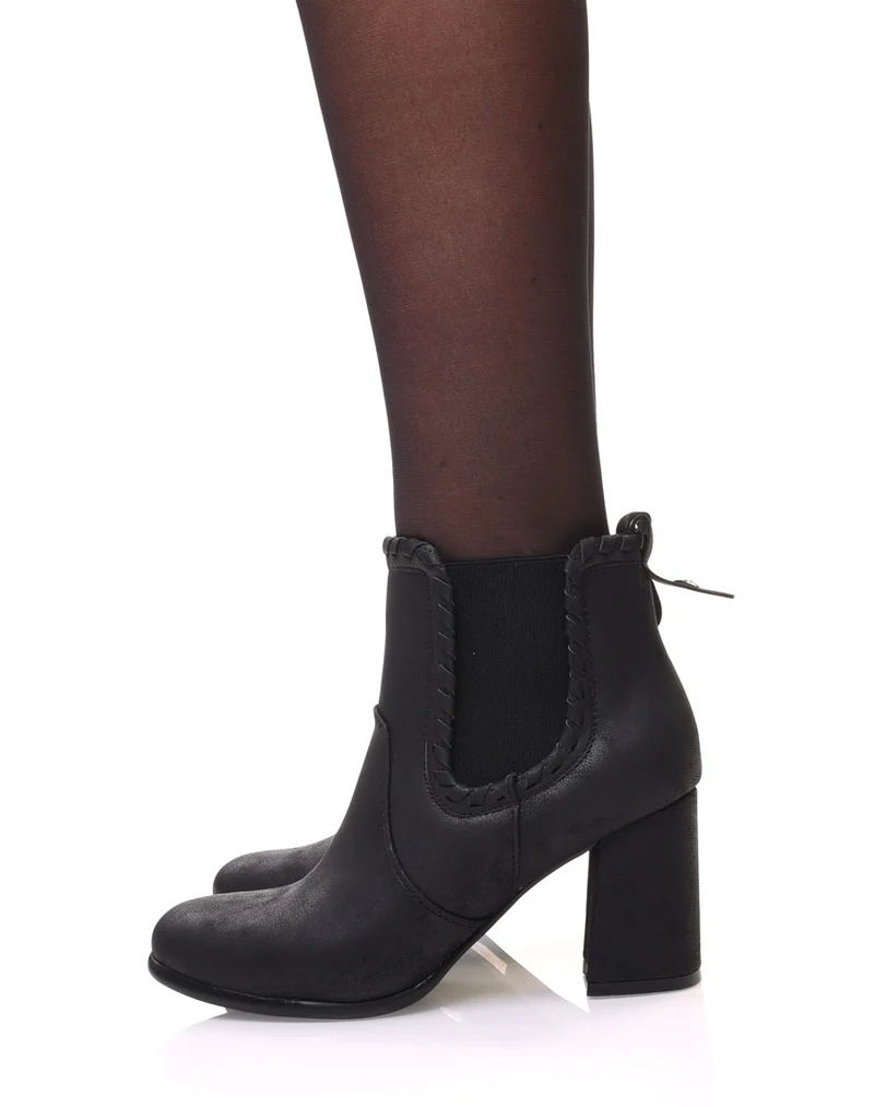 Bottines à talons noires en suédine et détails torsadés
