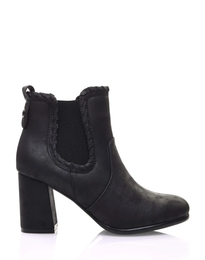 Bottines à talons noires en suédine et détails torsadés