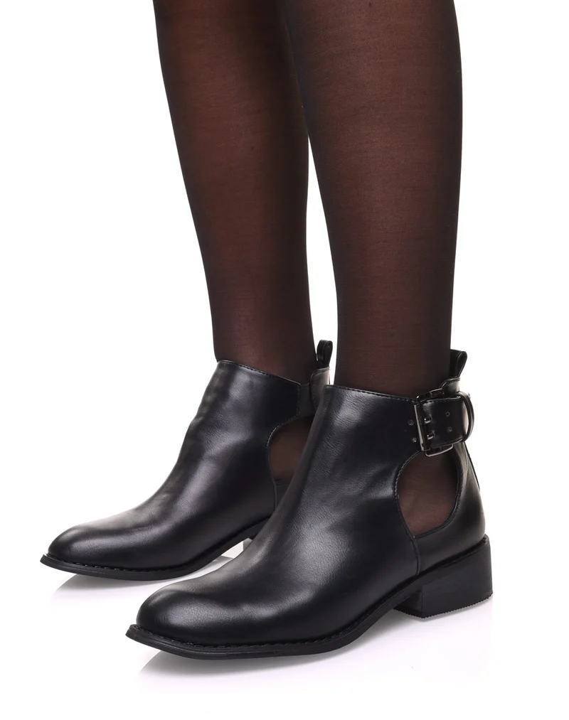 Bottines plates noires ajourées avec sangle