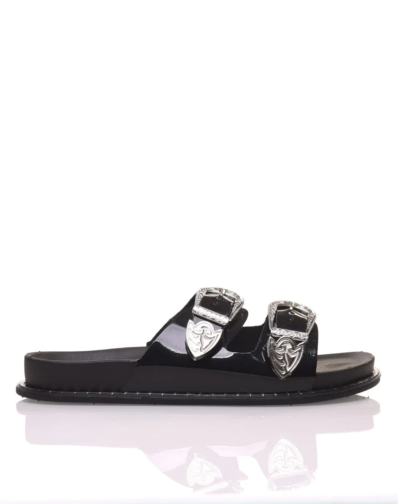 Mules noires à boucles argent