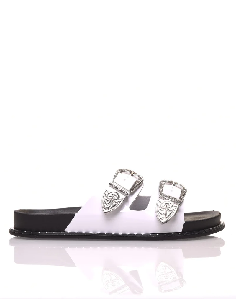Mules blanches à boucles argent