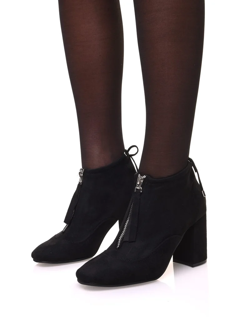 Bottines souples en suédine noires à talons hauts