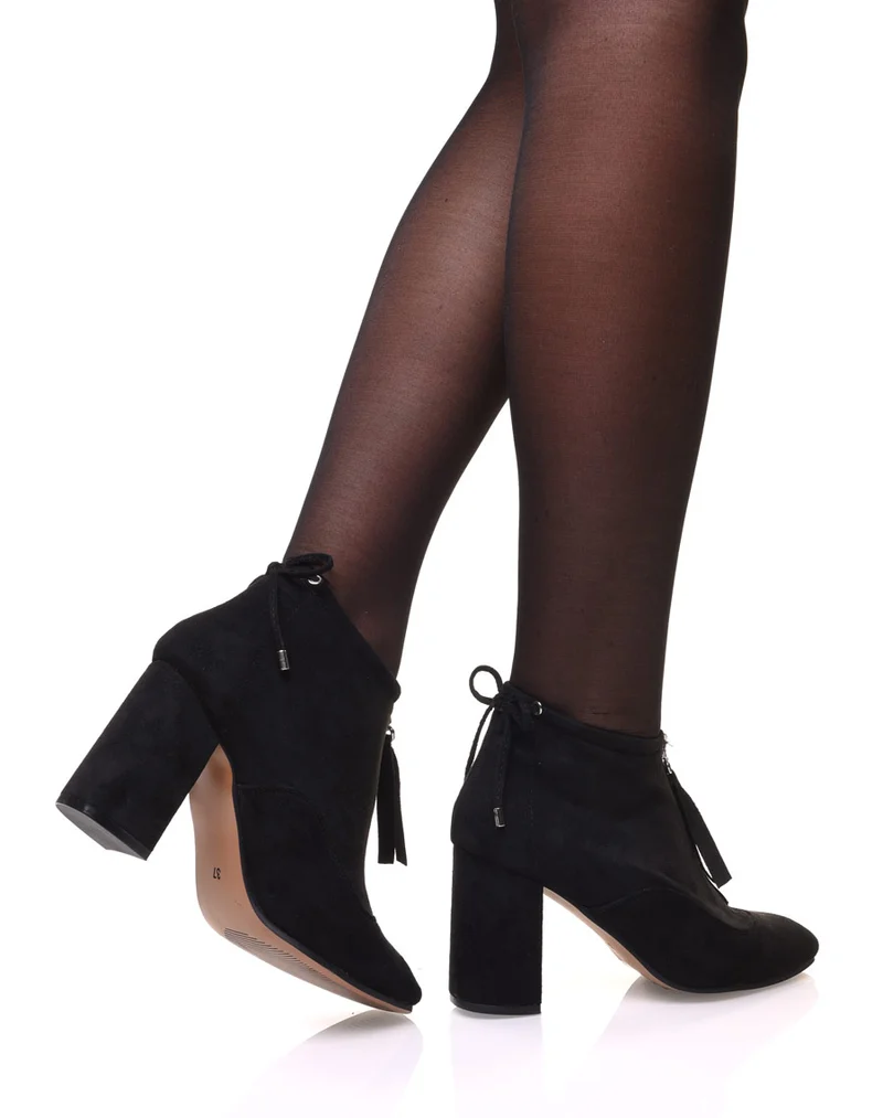 Bottines souples en suédine noires à talons hauts