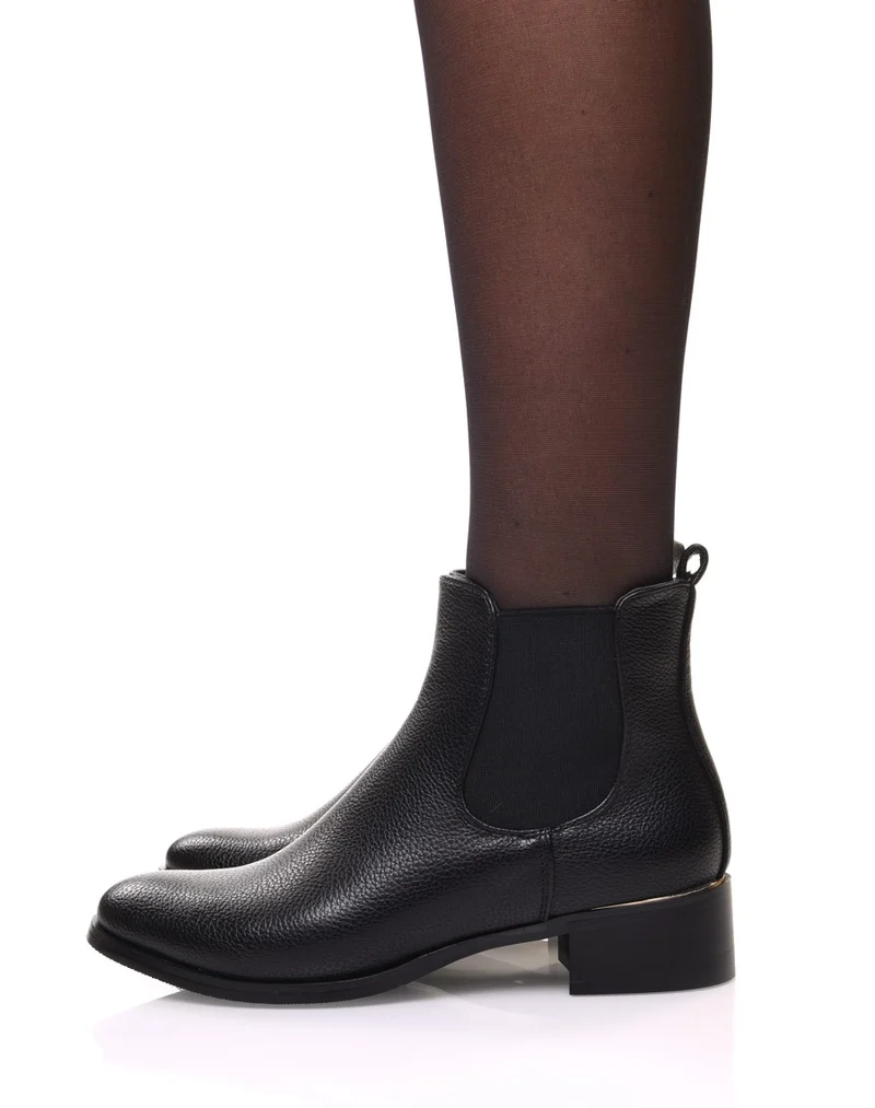 Chelsea boots noires à liseré doré