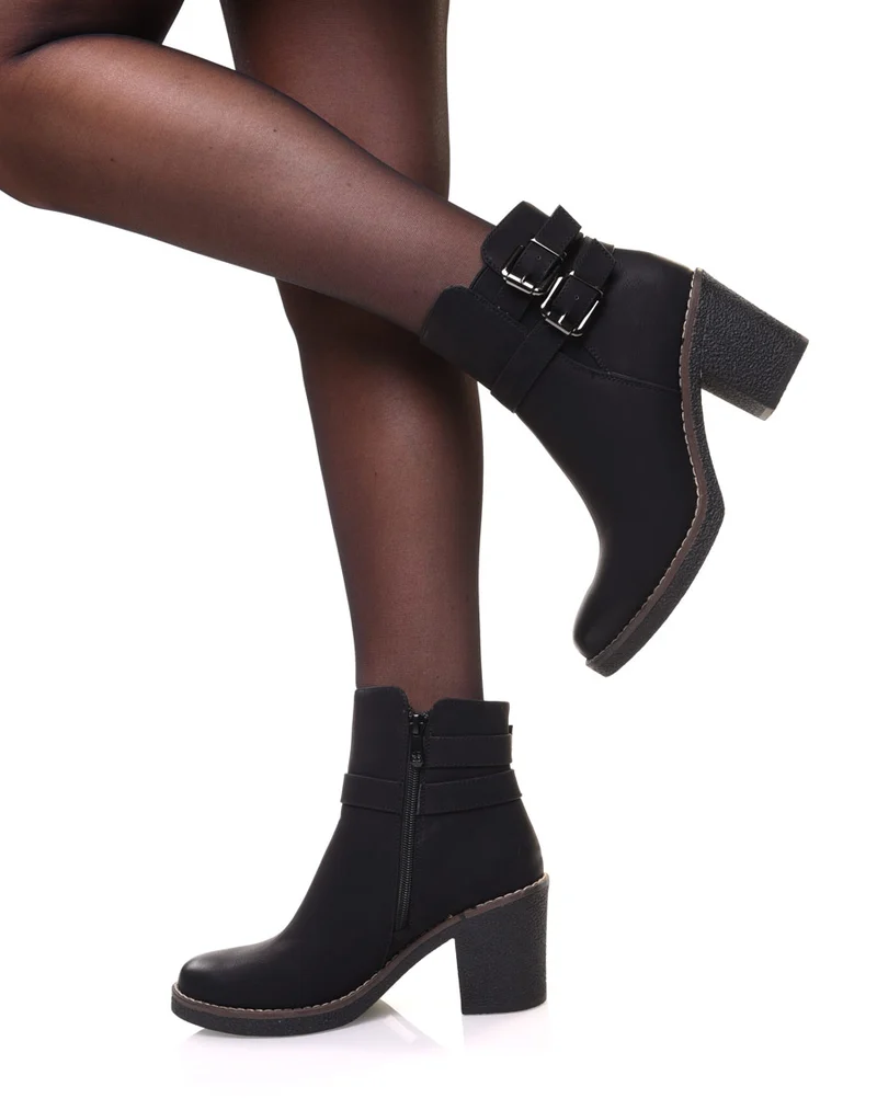Bottines noires effet vieilli à boucles