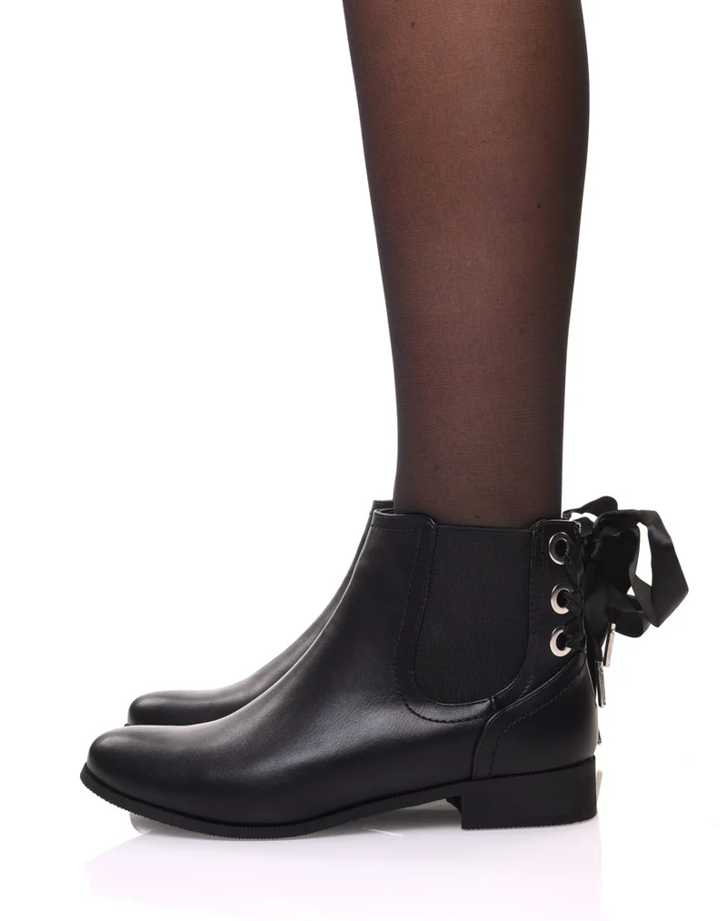 Chelsea boots noires à oeillets et noeud