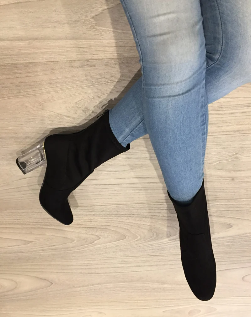 Bottines noires à talon transparent et haut souple