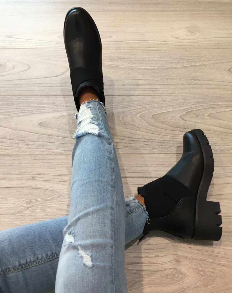Chelsea boots noires à élastiques croisés