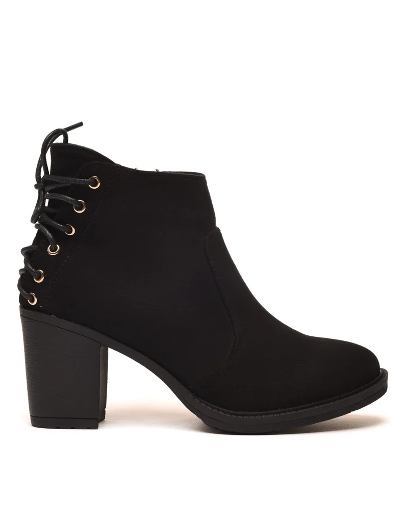 Bottines plates noires suédine à forme santiag