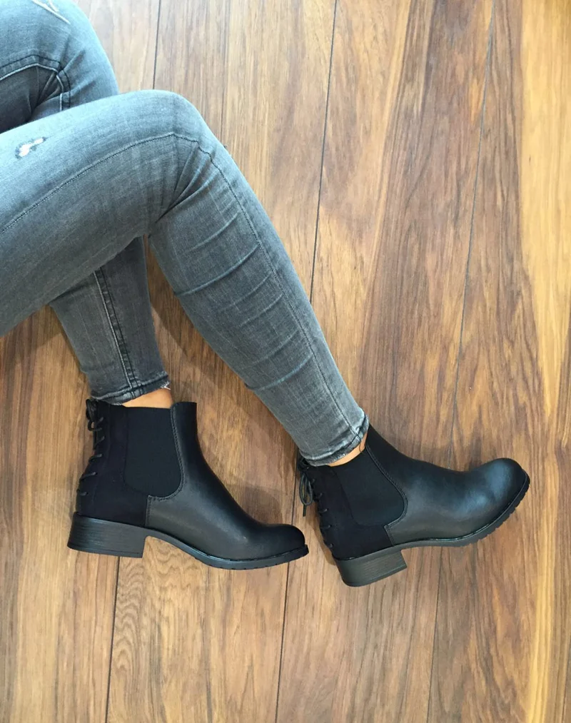 Bottines plates bi matières noires avec lacet décoratif arrière