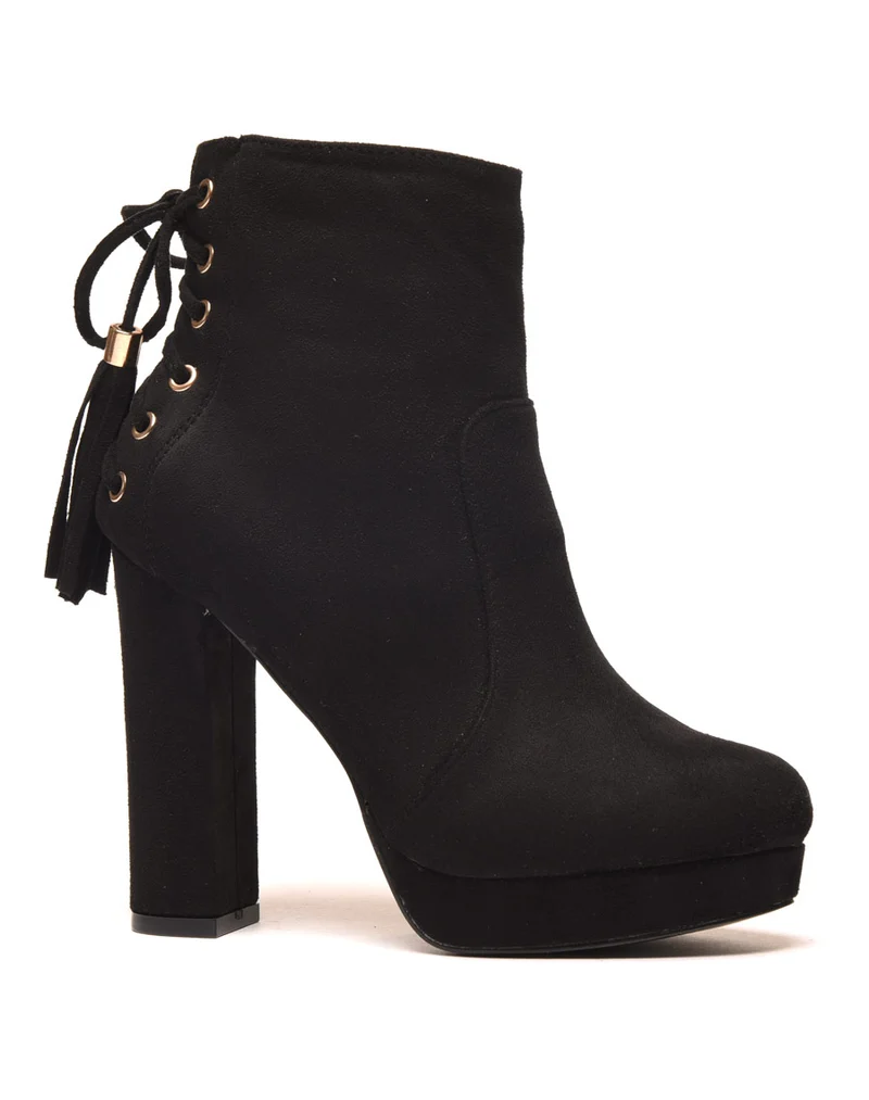 Bottines noires à talons hauts et plateforme
