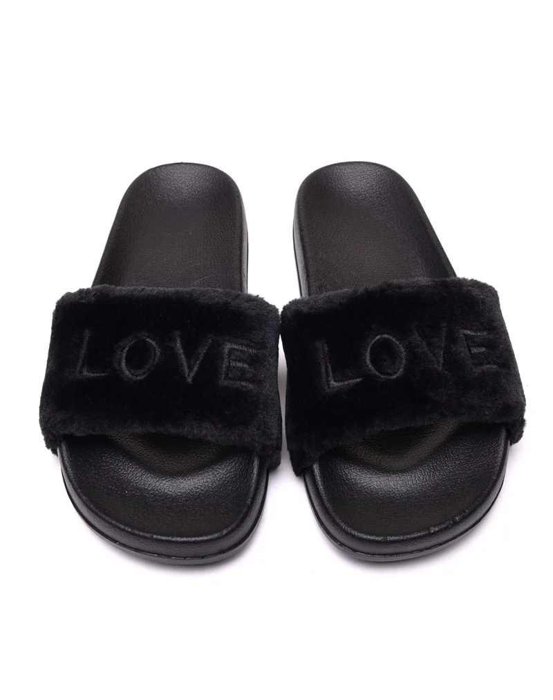 Claquettes noires à fourrure Love