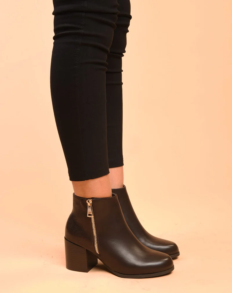 Bottines à talons noires avec fermeture & motifs python
