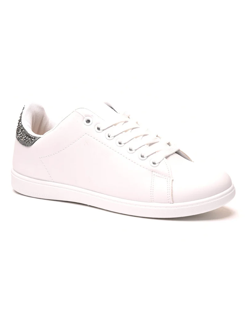 Baskets blanches avec détails strass noirs à l'arrière