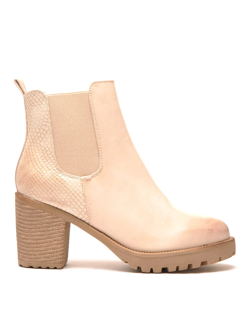 Magnifiques Chelsea boots beige effet patiné à l'avant