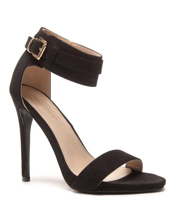 Sandales noires en suédine à hauts talons