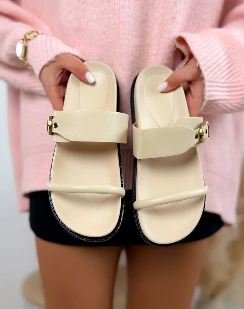 Mules beiges à bride avec boucle dorée