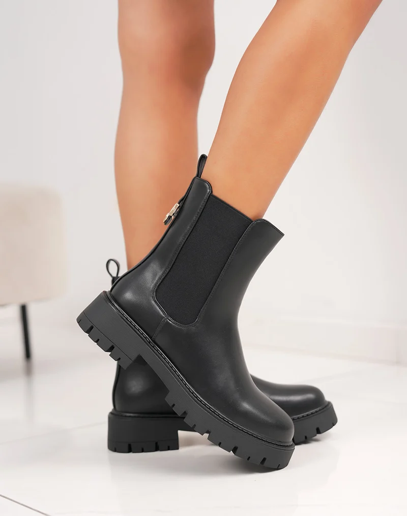 Bottines femme noires élégantes style chelsea avec boucle dorée et semelle crantée