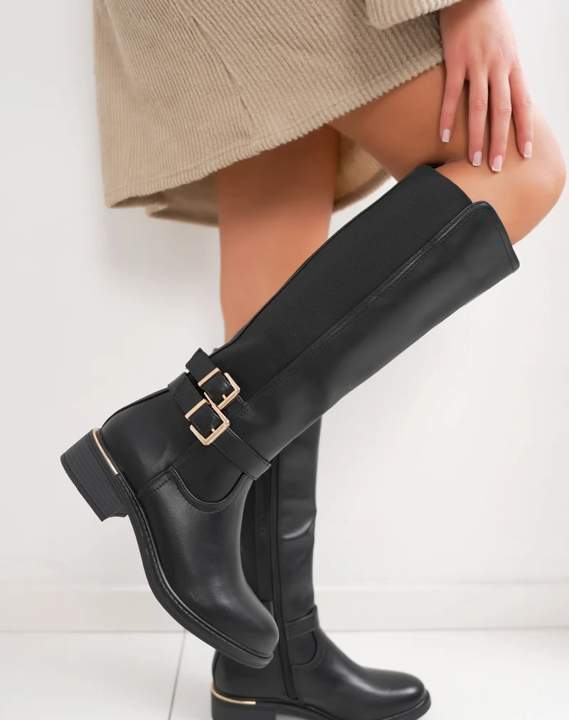 Bottes noires à élastique avec double boucle dorée et liseré – intérieur fourré