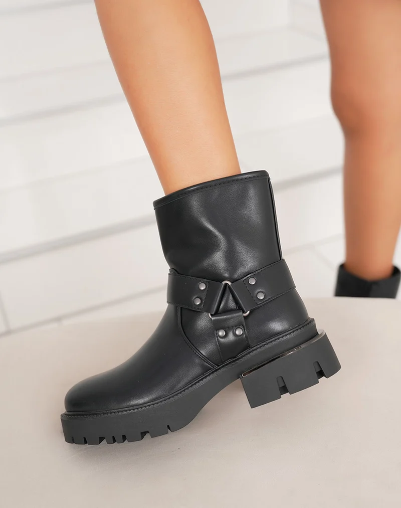 Bottines femme noires à semelle crantée, fourrées avec lanières décoratives et talon épais