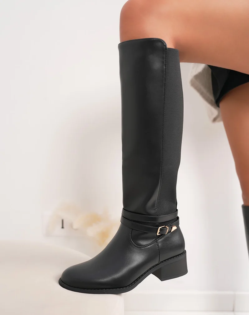 Bottes femme noires à petit talon avec lanière dorée et élastiques latéraux