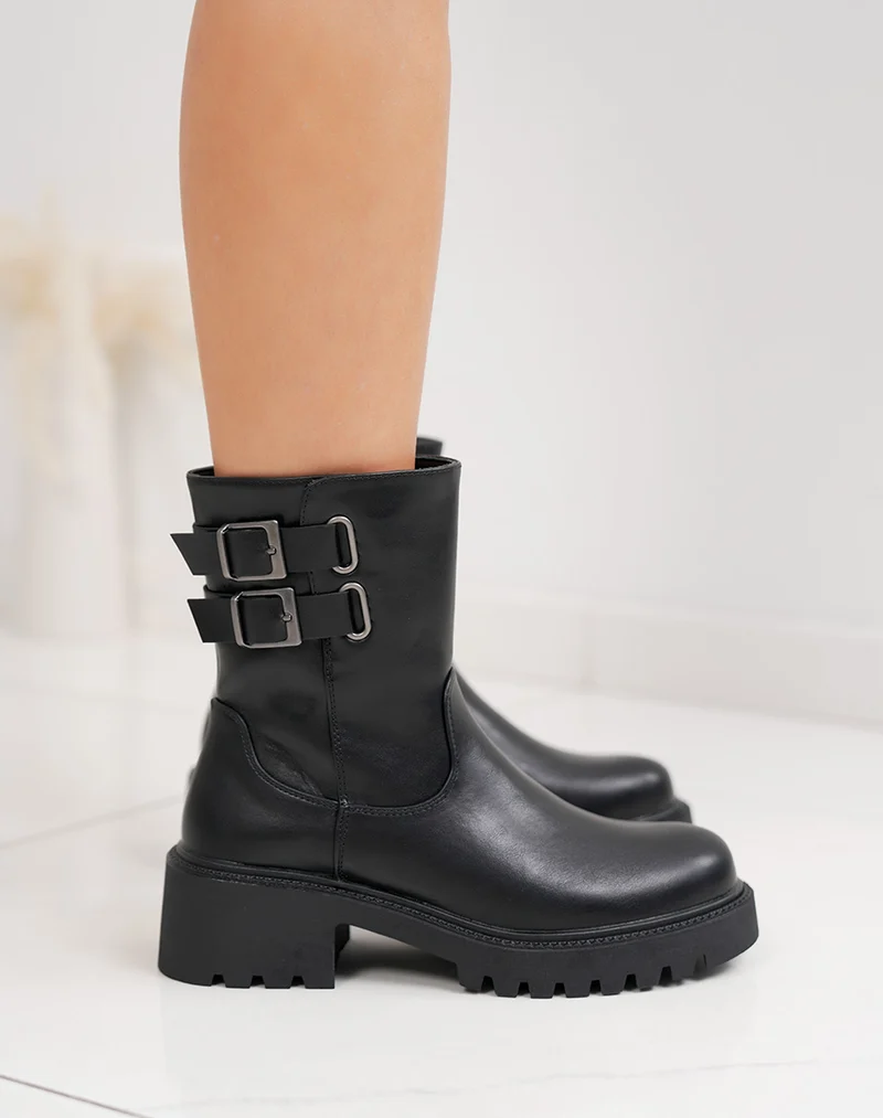 Bottines noires hautes à doubles sangles et semelle crantée