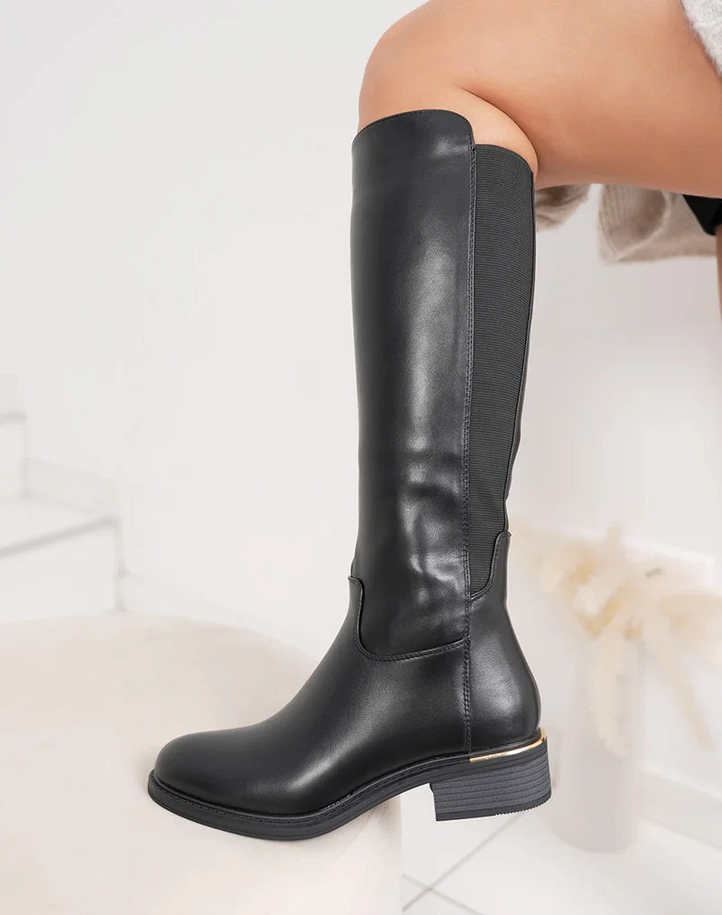 Bottes femme noires cavalières avec élastique et détail doré intérieur fourré