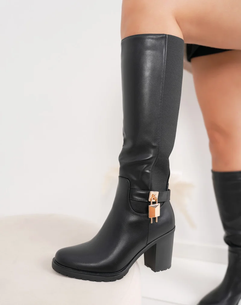 Bottes femme noires élégantes à talon haut avec détail doré et semelle crantée