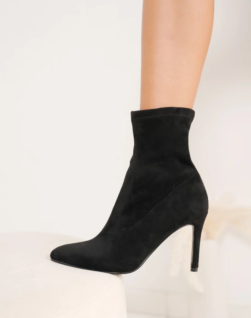 Bottines chaussettes noires en suédine à talon aiguille