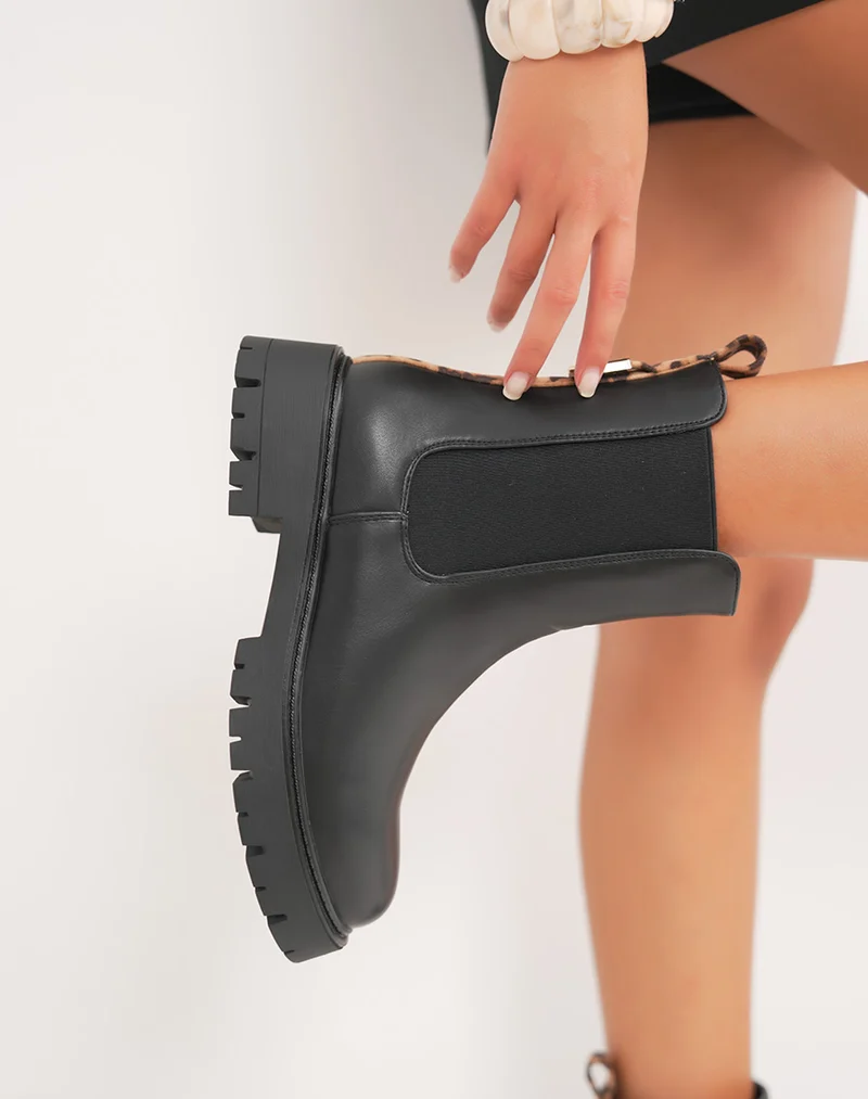 Bottines femme noires style Chelsea avec détail léopard et semelle crantée