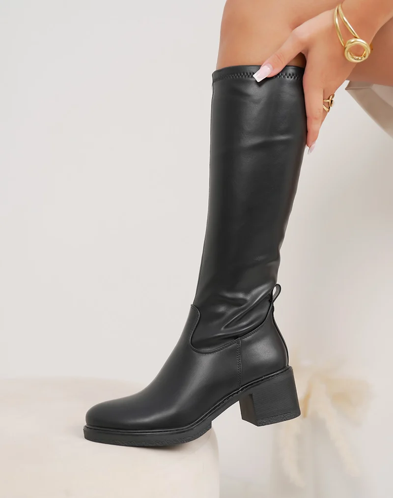 Bottes femme noires élégantes à talon épais moyen et bout rond fourré