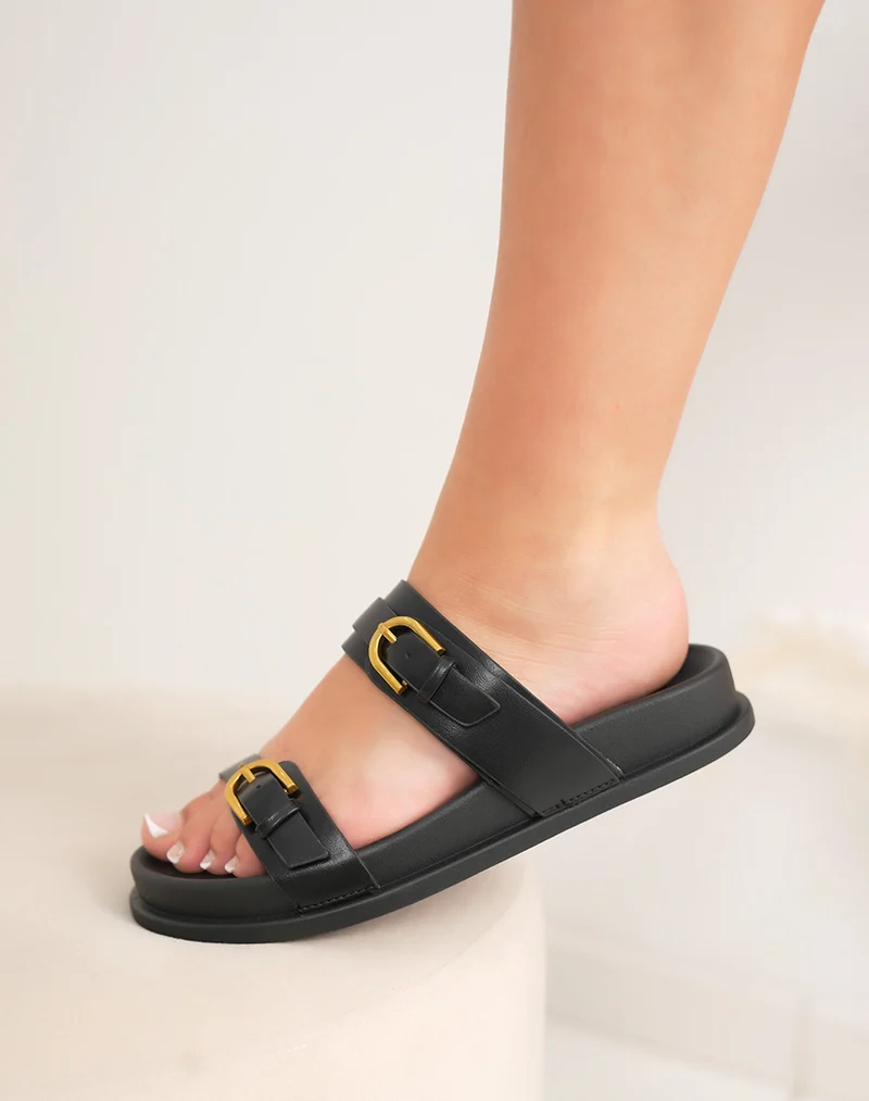 Mules femme noires à double brides et boucles dorées élégantes