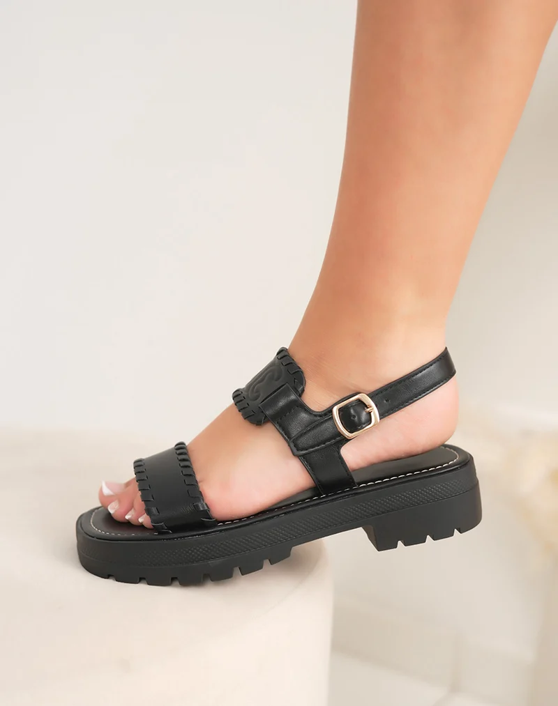 Mules femme noires à double brides avec logo incrusté et couture apparente