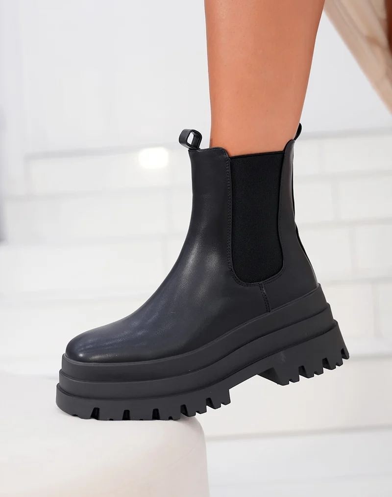Bottines femme noires style Chelsea avec triple plateforme et semelle crantée
